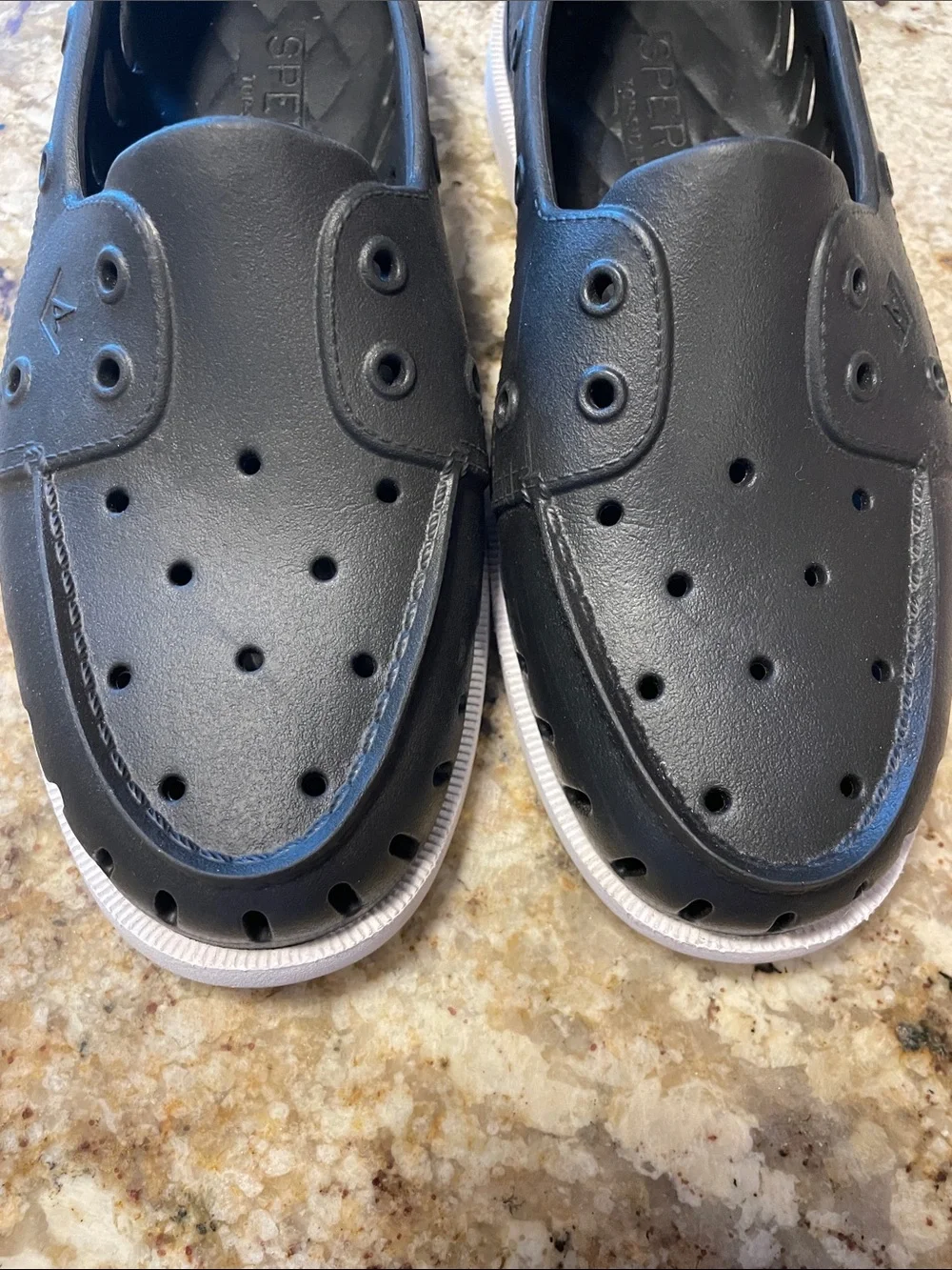 Sperry Men’s Black Perforated Slip-On Boat Shoes